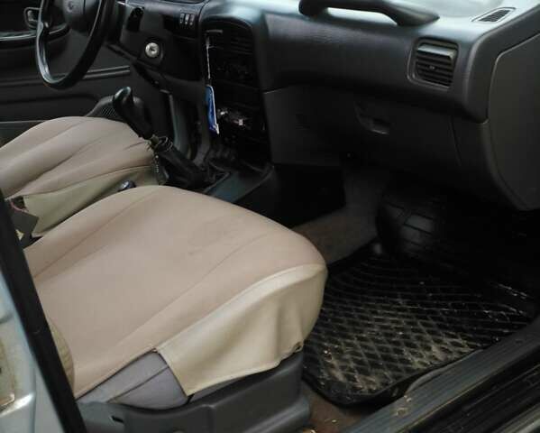 Серый Киа Sportage, объемом двигателя 2 л и пробегом 280 тыс. км за 3800 $, фото 2 на Automoto.ua