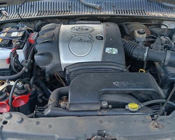 Серый Киа Sportage, объемом двигателя 2 л и пробегом 277 тыс. км за 3300 $, фото 17 на Automoto.ua