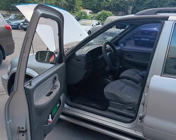 Серый Киа Sportage, объемом двигателя 2 л и пробегом 277 тыс. км за 3300 $, фото 7 на Automoto.ua