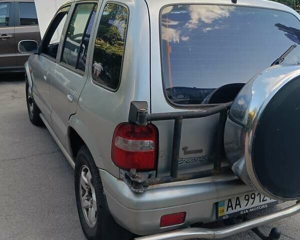 Серый Киа Sportage, объемом двигателя 2 л и пробегом 277 тыс. км за 3300 $, фото 10 на Automoto.ua