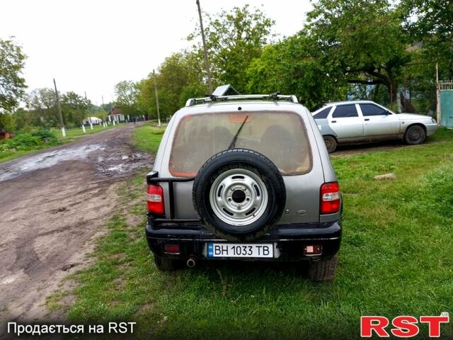 Серый Киа Sportage, объемом двигателя 2 л и пробегом 266 тыс. км за 3200 $, фото 3 на Automoto.ua