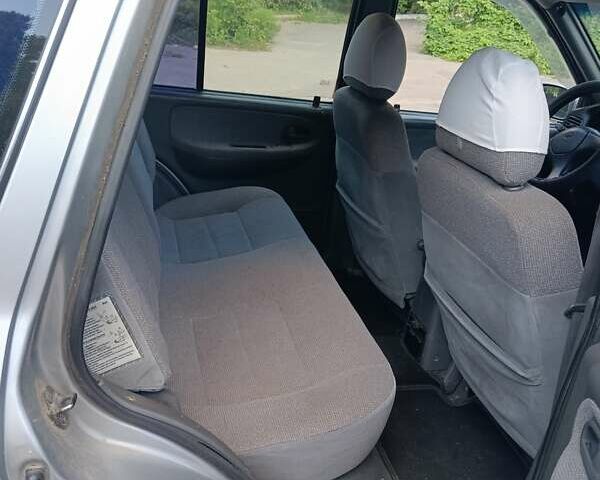 Серый Киа Sportage, объемом двигателя 2 л и пробегом 277 тыс. км за 3300 $, фото 14 на Automoto.ua