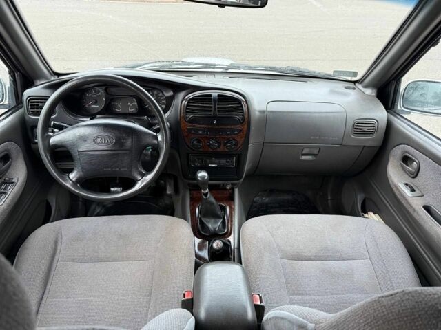 Серый Киа Sportage, объемом двигателя 2 л и пробегом 300 тыс. км за 3092 $, фото 6 на Automoto.ua