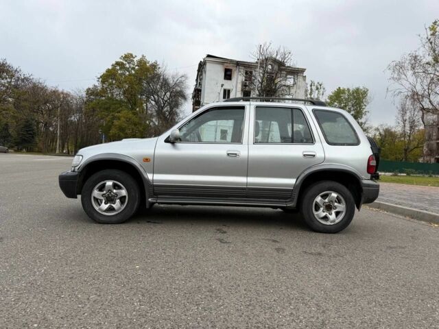 Серый Киа Sportage, объемом двигателя 2 л и пробегом 300 тыс. км за 3092 $, фото 1 на Automoto.ua