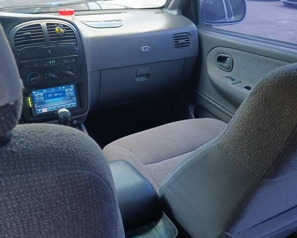 Серый Киа Sportage, объемом двигателя 2 л и пробегом 277 тыс. км за 3300 $, фото 4 на Automoto.ua