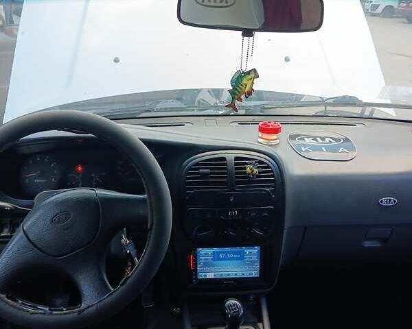 Серый Киа Sportage, объемом двигателя 2 л и пробегом 277 тыс. км за 3300 $, фото 5 на Automoto.ua