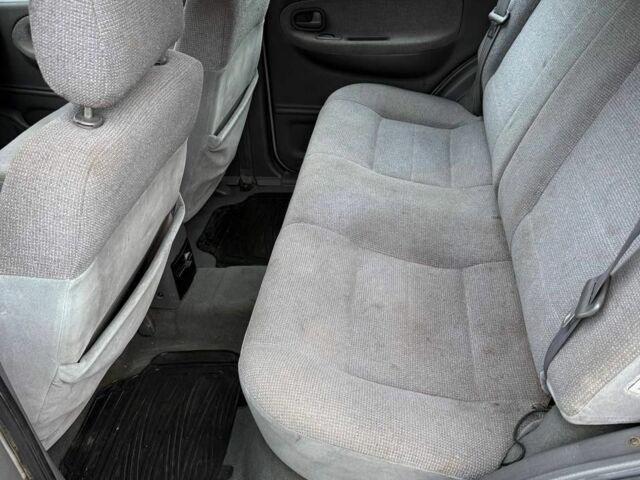 Серый Киа Sportage, объемом двигателя 2 л и пробегом 300 тыс. км за 3092 $, фото 4 на Automoto.ua