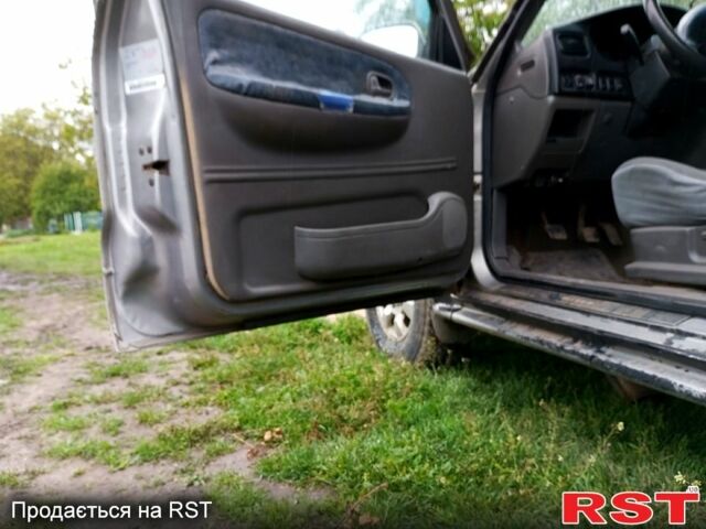 Серый Киа Sportage, объемом двигателя 2 л и пробегом 266 тыс. км за 3200 $, фото 8 на Automoto.ua