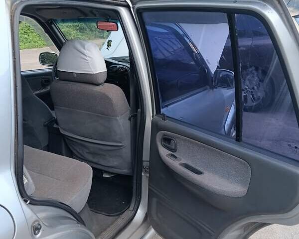 Серый Киа Sportage, объемом двигателя 2 л и пробегом 277 тыс. км за 3300 $, фото 13 на Automoto.ua