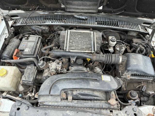 Серый Киа Sportage, объемом двигателя 2 л и пробегом 300 тыс. км за 3092 $, фото 5 на Automoto.ua