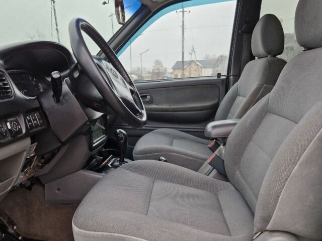 Серый Киа Sportage, объемом двигателя 2 л и пробегом 300 тыс. км за 4500 $, фото 7 на Automoto.ua