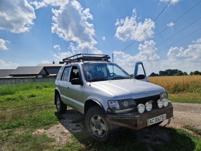 Серый Киа Sportage, объемом двигателя 2 л и пробегом 300 тыс. км за 4500 $, фото 22 на Automoto.ua