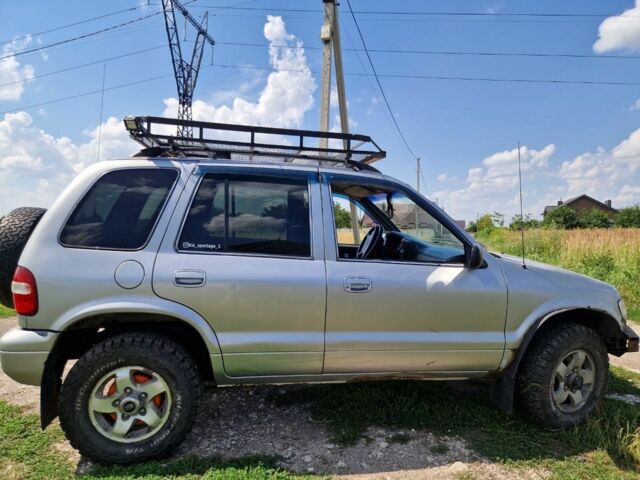 Серый Киа Sportage, объемом двигателя 2 л и пробегом 300 тыс. км за 4500 $, фото 11 на Automoto.ua