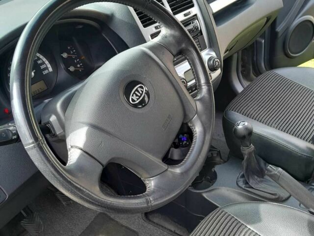 Серый Киа Sportage, объемом двигателя 2 л и пробегом 220 тыс. км за 7900 $, фото 5 на Automoto.ua