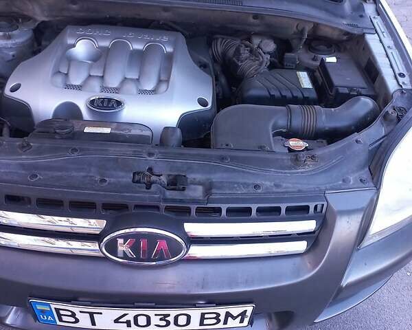 Серый Киа Sportage, объемом двигателя 1.98 л и пробегом 284 тыс. км за 7000 $, фото 4 на Automoto.ua