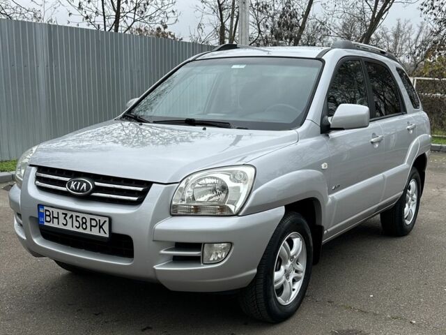 Серый Киа Sportage, объемом двигателя 2 л и пробегом 250 тыс. км за 7900 $, фото 2 на Automoto.ua