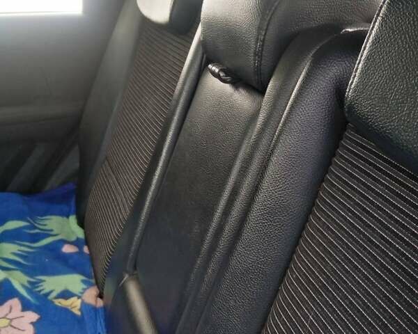 Сірий Кіа Sportage, об'ємом двигуна 2 л та пробігом 137 тис. км за 8000 $, фото 5 на Automoto.ua