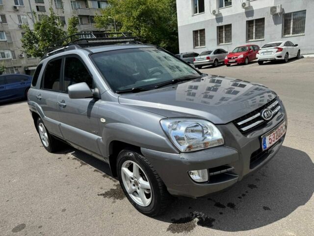 Серый Киа Sportage, объемом двигателя 2 л и пробегом 200 тыс. км за 4200 $, фото 2 на Automoto.ua