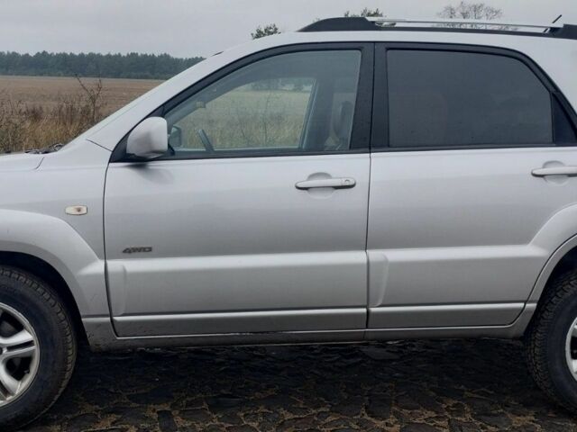 Серый Киа Sportage, объемом двигателя 2 л и пробегом 334 тыс. км за 3999 $, фото 5 на Automoto.ua