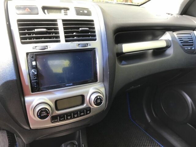 Сірий Кіа Sportage, об'ємом двигуна 2 л та пробігом 240 тис. км за 6700 $, фото 4 на Automoto.ua