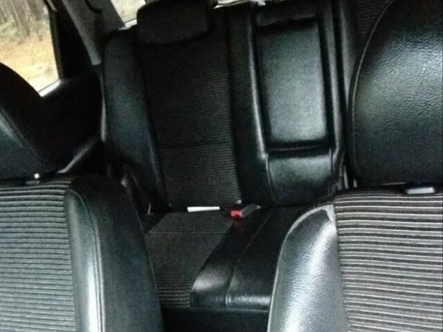 Серый Киа Sportage, объемом двигателя 2 л и пробегом 334 тыс. км за 3999 $, фото 3 на Automoto.ua