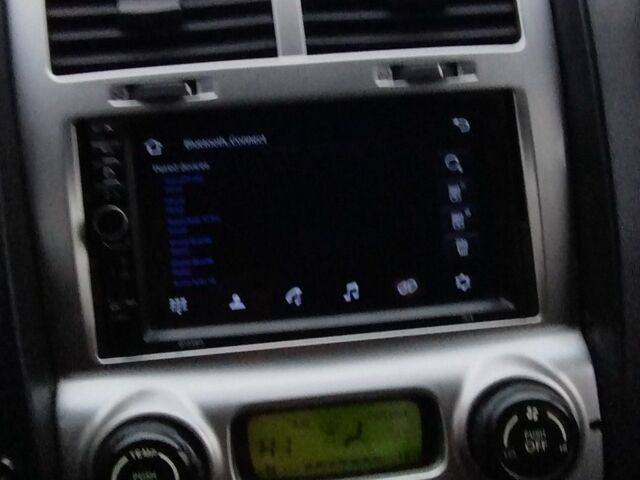 Серый Киа Sportage, объемом двигателя 2 л и пробегом 334 тыс. км за 4399 $, фото 7 на Automoto.ua