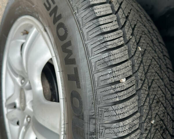 Серый Киа Sportage, объемом двигателя 2 л и пробегом 250 тыс. км за 7900 $, фото 22 на Automoto.ua