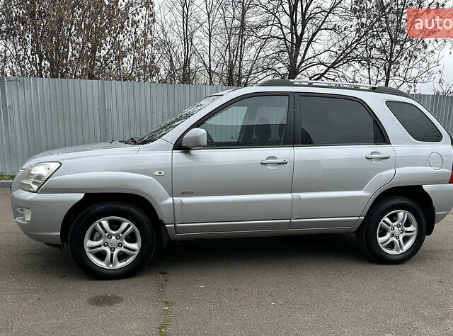 Серый Киа Sportage, объемом двигателя 2 л и пробегом 250 тыс. км за 7900 $, фото 6 на Automoto.ua