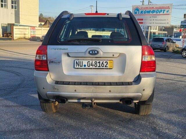 Серый Киа Sportage, объемом двигателя 2 л и пробегом 189 тыс. км за 4453 $, фото 4 на Automoto.ua