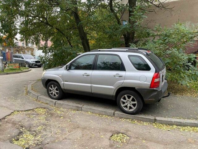 Серый Киа Sportage, объемом двигателя 2 л и пробегом 256 тыс. км за 5999 $, фото 1 на Automoto.ua