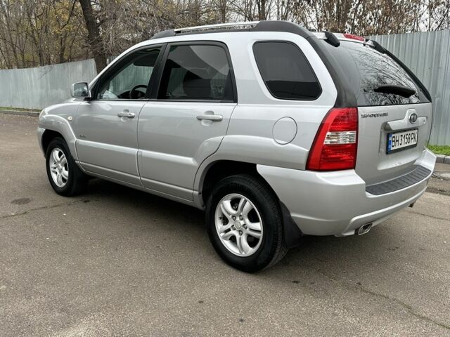 Серый Киа Sportage, объемом двигателя 2 л и пробегом 250 тыс. км за 7900 $, фото 4 на Automoto.ua