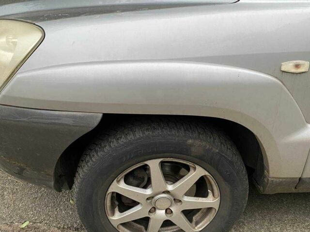 Серый Киа Sportage, объемом двигателя 2 л и пробегом 256 тыс. км за 5999 $, фото 2 на Automoto.ua