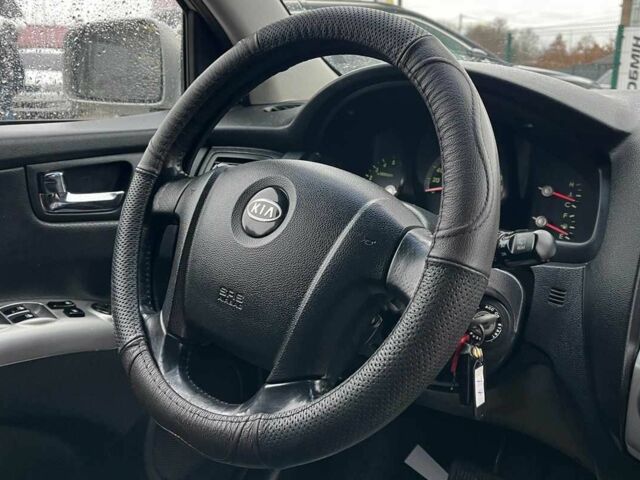 Серый Киа Sportage, объемом двигателя 2 л и пробегом 265 тыс. км за 7600 $, фото 14 на Automoto.ua