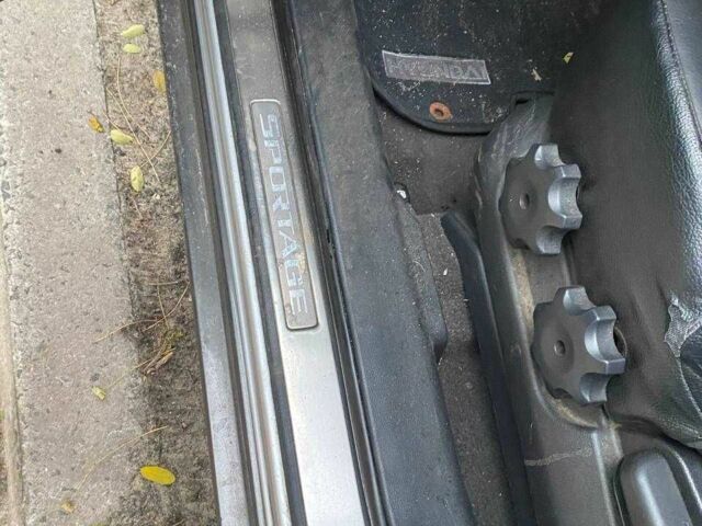 Серый Киа Sportage, объемом двигателя 2 л и пробегом 256 тыс. км за 5999 $, фото 6 на Automoto.ua