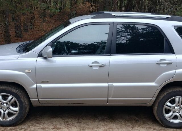 Серый Киа Sportage, объемом двигателя 2 л и пробегом 334 тыс. км за 4399 $, фото 3 на Automoto.ua