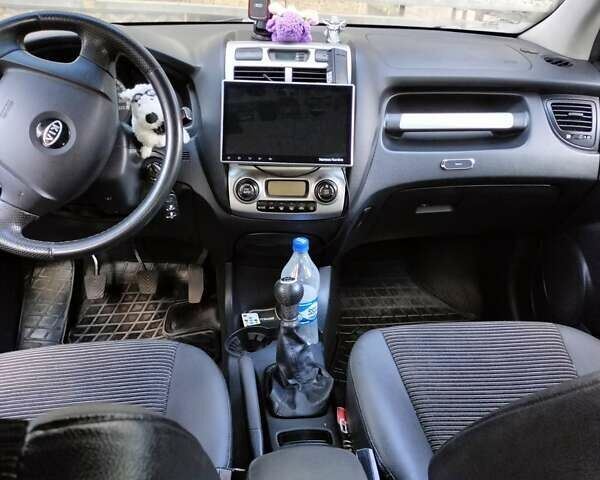 Серый Киа Sportage, объемом двигателя 2 л и пробегом 226 тыс. км за 4500 $, фото 12 на Automoto.ua