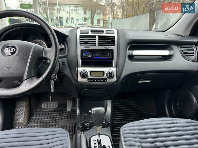 Серый Киа Sportage, объемом двигателя 2 л и пробегом 250 тыс. км за 7900 $, фото 21 на Automoto.ua
