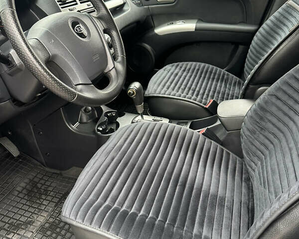 Серый Киа Sportage, объемом двигателя 2 л и пробегом 250 тыс. км за 7900 $, фото 17 на Automoto.ua