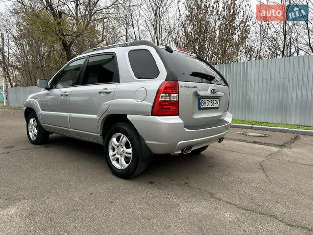 Серый Киа Sportage, объемом двигателя 2 л и пробегом 250 тыс. км за 7900 $, фото 24 на Automoto.ua