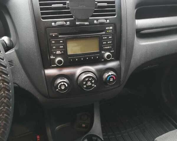 Серый Киа Sportage, объемом двигателя 2 л и пробегом 198 тыс. км за 6800 $, фото 7 на Automoto.ua