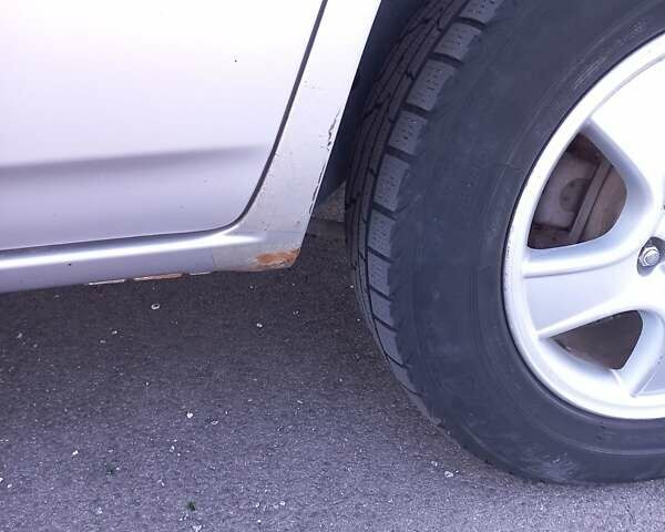 Серый Киа Sportage, объемом двигателя 1.98 л и пробегом 284 тыс. км за 7000 $, фото 2 на Automoto.ua