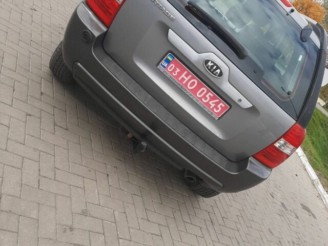 Серый Киа Sportage, объемом двигателя 2 л и пробегом 240 тыс. км за 6599 $, фото 6 на Automoto.ua