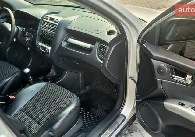 Серый Киа Sportage, объемом двигателя 2 л и пробегом 288 тыс. км за 6999 $, фото 32 на Automoto.ua