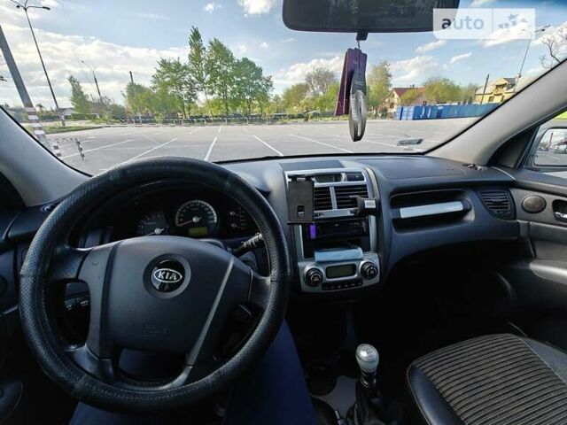 Серый Киа Sportage, объемом двигателя 2 л и пробегом 320 тыс. км за 7400 $, фото 18 на Automoto.ua