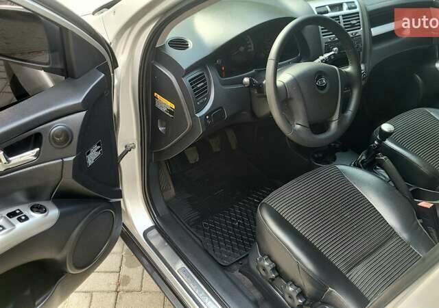 Серый Киа Sportage, объемом двигателя 2 л и пробегом 288 тыс. км за 6999 $, фото 27 на Automoto.ua