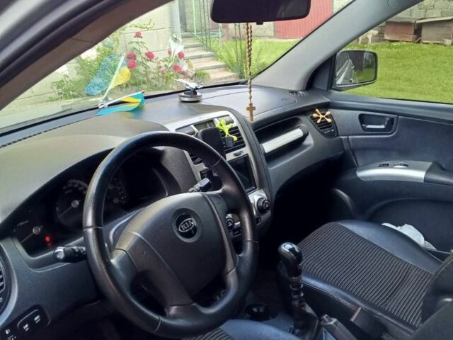Серый Киа Sportage, объемом двигателя 2 л и пробегом 238 тыс. км за 9200 $, фото 1 на Automoto.ua