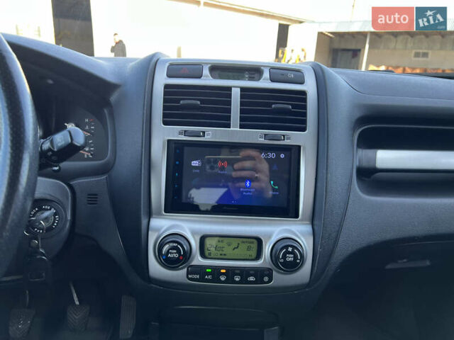 Сірий Кіа Sportage, об'ємом двигуна 2 л та пробігом 162 тис. км за 6950 $, фото 30 на Automoto.ua