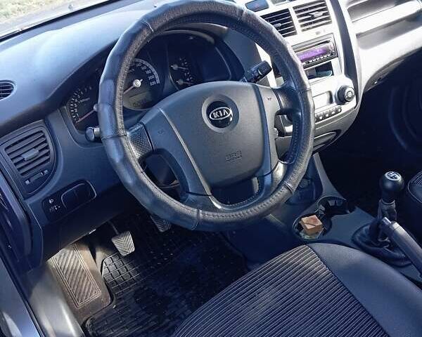 Серый Киа Sportage, объемом двигателя 1.98 л и пробегом 150 тыс. км за 7500 $, фото 22 на Automoto.ua