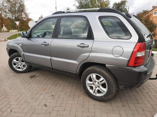 Серый Киа Sportage, объемом двигателя 2 л и пробегом 240 тыс. км за 6599 $, фото 2 на Automoto.ua