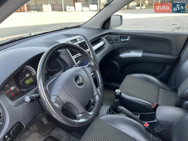 Сірий Кіа Sportage, об'ємом двигуна 2 л та пробігом 162 тис. км за 6950 $, фото 24 на Automoto.ua